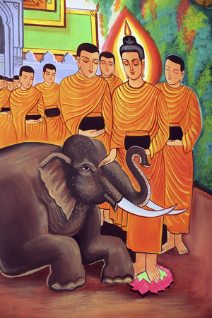 20151029, Vientiane, Laos : Wat Si Muang ( Simuong) buddhist temple. Painting depicting the life story of Shakyamuni Buddha. A wild elephant tamed by loving-kindness