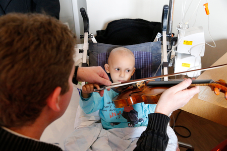 France, Val-de-Marne, Villejuif : French N,G,O, Musique et Sante (Music and Health), Music therapy in children's ward