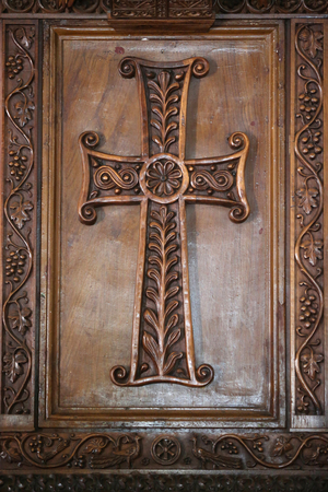 Carouge, Geneva, Switzerland, le 11/8/2015 - Carouge protestant temple. Carved wooden pulpit. Christian cross.