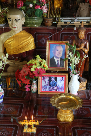 Photographs in a Khmer pagoda. Cambodia