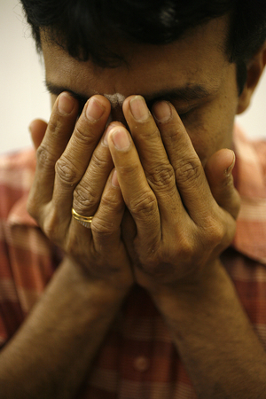 Hindu prayer in a Sri Lankan temple, Paris, France