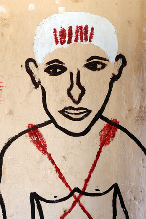 Voodoo wall painting on a convent. Togoville, Togo