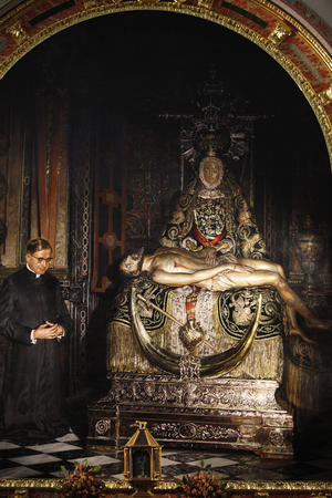 Painting depicting Opus Dei founder JosemarÕa Escrivà de Balaguer next to a Pieta sculpture Grenade Espagne