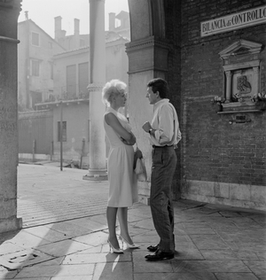 THE ACTRESS CORINNE MARCHAND WITH THE ACTOR JEAN - PIERRE (jean-pierre) CASEL - VENICE - 1963