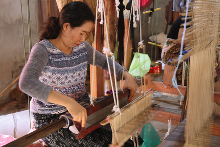 Laos, silk weaving (photo)