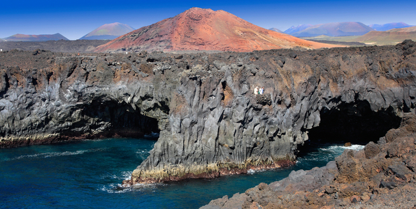 The of Fuerteventura, dechicte coast and basaltic cave overlooking the sea (photo)