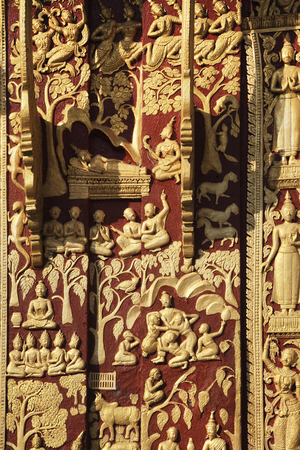 Laos, Luang Prabang, Vat Xien Thong Buddhist temple, gilded reliefs on chapel facade (photo)