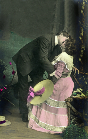 Man giving a kiss to a woman. Photography around 1910