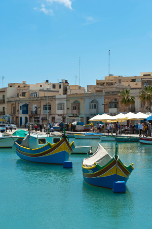 Colorfully painted traditional fishing boats; Luzzu; harbour of Marsaxlokk; Malta; Europe