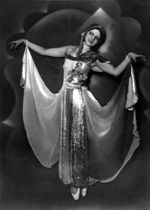 Woman dancer in stage dress. Photography around 1931