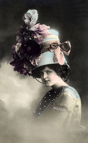 Woman carrying a bucket on her head. photography around 1910
