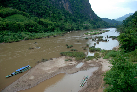 Natural river; unspoiled nature; boats on the Nam Ou river; Nong Khiaw; Luang Prabang province; Laos; Southeast Asia; Asia