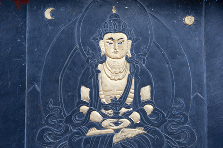Tibetan Buddhism; stone relief; image of Buddha; Bhumisparsha Mudra; touching the earth; Dochu-La-Pass; the Himalayas; Kingdom of Bhutan; South Asia;