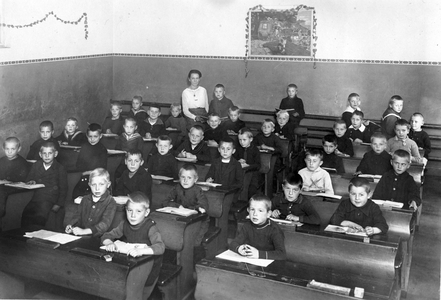 School class in a boys' school with their teacher.