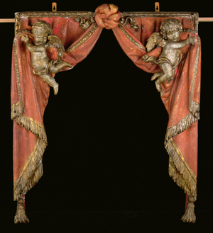 Pair of Putti supporting curtains, c.1650 (gilt & polychrome wood)