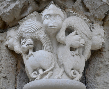 Avy, Church of Notre Dame. exterior capital on the portal