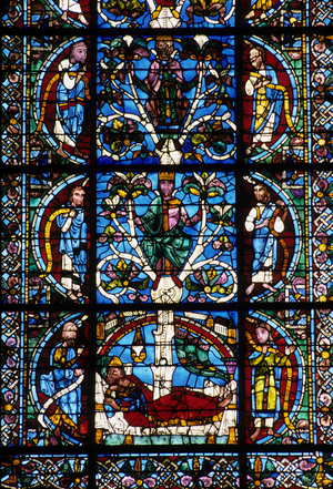 Gothic architecture. Genealogy of Christ - Tree of Jesse (detail): Jesse is asleep and a tree comes out of her body. 1150. Stained glass of the Royal Portal. Cathedrale de Chartres.