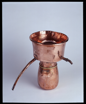 18th century copper still. Dim: 38 cm high and 27 cm diameter. Musee de l'hospice Saint-Roch, Issoudun. Mandatory mention: