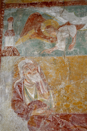 Jesus tries to hear the message of the angel who came to warn him. Fresco of the choir of the church Saint Aignan (11th and 12th century) in Brinay, Cher (18120), Centre, France.