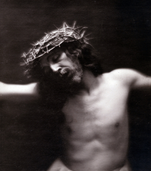 Jesus Christ on the cross with crown of thorns (photo)