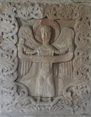 Roman altar. Probably the Archangel Gabriel holding a banner whose inscription has disappeared. In the aerian chapel known as Saint Michael of the Church of Saint Peter of Bessuejouls (Aveyron 12500)