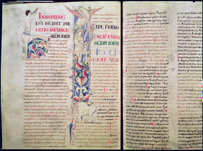 Ms 12/15 t.4 f.56v Historiated initial 'H' depicting a centaur and historiated initial 'I' depicting the eagle of St. John silencing the heretic Arius, from the Gospel of St. John, Bible of St. Etienne Harding (vellum)