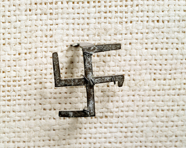 Christian antiquite: fibule in the shape of svastika, 1st to 3rd century (metal)