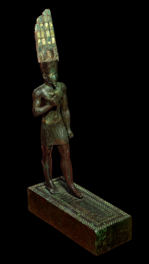Ancient Egypt Art: The god Amon. Black bronze sculpture inlaid and plaque, 715 - 525 BC (bronze)