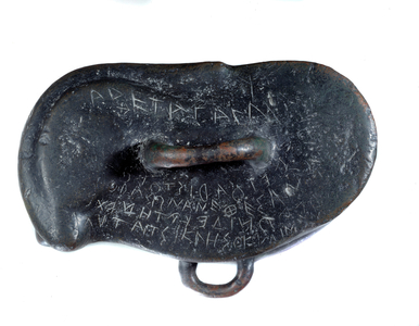 Bronze votive weight in the shape of an osselet, dedicated to Apollo of Didymus in Miletus, 4th century BC (bronze)