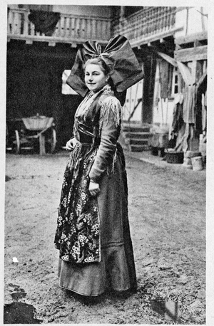 Alsace: young woman in Alsatian costume, early 20th century (postcard)