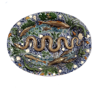 Pond decorates rustic figurines called "the snake dish". Ceramic in glazed earth, 1560 (ceramic)