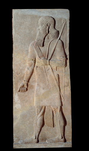 Art Mesopotamia: Warrior in arms from the court of the palace of the king of Assyria Sargon II (721 - 705 BC) (bas-relief)