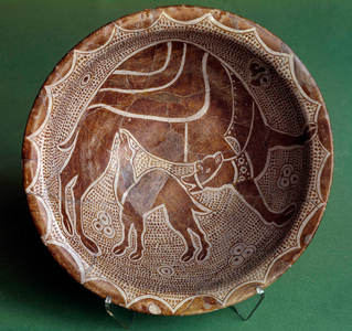 Islamic art: cut to the camel nursing her baby. From Iraq, 10th century (ceramic)