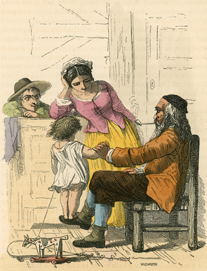 Peter playing with his grandchild