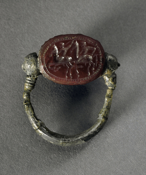 Ring with scarab; a pair of horsemen galloping towards the left, armed with javelins, 340-330 BC (silver, chalcedony)