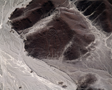 Aerial view of Nazca Lines representing a human figure (photography, 1983)