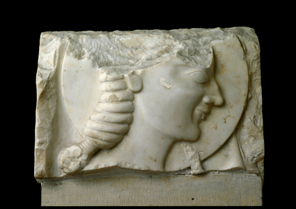 Burial stele fragment with disc. 650 BC (low relief)