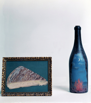 Bottle and “” This is not a piece of cheese”” Painting by Rene Magritte (1898-1967), 1936. Painted bottle and paint. Brussels, Private Collection.