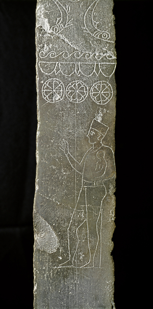 Detail of a Punic stele with representation of a high priest holding the arm of a child intended for sacrifice, from the Tophet of Salammbo, 4th century BC.