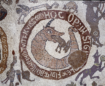 Representation of the Leviathan in the form of a crocodile embodying Satan holding in his mouth a hare representing the human being. Mosaic of Pantaleone, priest and mosaic. 1163-1166. Central nave of the Cathedrale of Otranto (Otranto), Italy