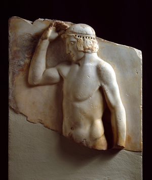 Greek antiquite: “” Autostephanoumenos or crowning athlete””, marble sculpture from the temple of Athena a Sounion, 460-450 BC - Athenes, National Archaeological Museum - Autostephanoumenos (Self-crowning athlete) - Marble votive tablet found in Sounion, near the Temple of Athena, 460-450 BC - National Archaeological Museum, Athens