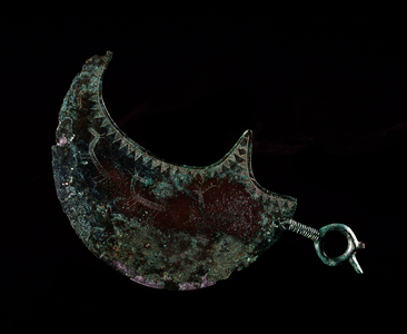 Bronze razor, 9th century BC