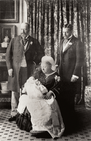 Queen Victoria (1819-1901) with the Prince of York on her knees, the Prince of Wales on her left and the Duke of York on her right, 1894 (b/w photo)