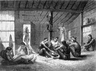 Illustration published in the 1862 edition of “Le Tour du monde” depicting the interior of a dayake house on the island of Borneo. Engraving.