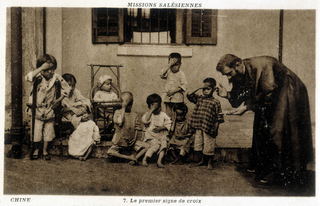 Salesian missionary learning the sign of the cross from Chinese children, 1900.