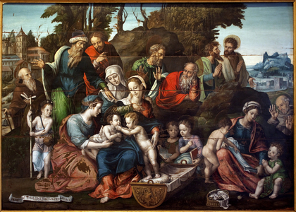 La Sainte Parente. (Sainte Anne, entouree de ses trois maris successifs, Salome (tunique bleue, avec l'index pointe), Cleophas (a ses cotes avec manteau rouge, pere de Marie Cleophas) et Joachim, pere de la Vierge (manteau rouge, tete reposant sur le poing). Au centre, le Christ enfant juche sur son berceau, la vierge Marie qui le soutient, sainte Anne portant un fichu blanc et derriere elles, les mains levees, saint Joseph. L'enfant face au Christ est saint Jean l'evangeliste, soutenu par sa mere Marie Salome (fille de sainte Anne et Salome, epouse de Zebedee), avec a sa gauche son fils aine, Saint Jacques le majeur appuye sur son baton de pelerin et a l'arriere, saint Antoine le Grand (ou Saint Antoine l'ermite ou Saint Antoine l'abbe) reconnaissable a sa clochette, lequel avec Saint Francois d'Assise, visible a l'extreme droite, sont les seuls a ne pas appartenir a la lignee de Sainte Anne. Marie Cleophas est entouree de ses fils, de droite a gauche saint Jude, saint Simon, Joseph le juste et saint Jacques le mineur. Les deux personnages a l'arriere droite sont Zebedee, epoux de Marie Salome, les mains jointes en priere et Alphee, epoux de Marie Cleophas. Peinture de Simon de Chalons (actif 1532 a 1562), huile sur bois de noyer, 1543. Art francais 16e siecle. Musee des Beaux arts d'Avignon. 