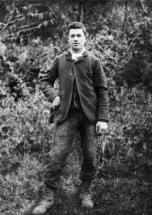Portrait of a young man, in the garden of the Abbey of Septfontaines, near Bourmont en Haute Marne. Photography late 19th century. Ducos Collection.