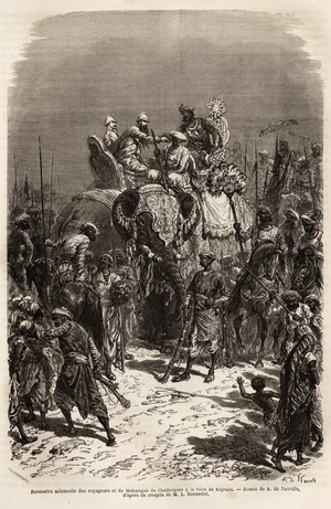 Solemn meeting and hand-held on the back of an elephant, between the team of travelers and the Maharajah of Chutterpore, at the fair of Kajraha. Engraving to illustrate the voyage in India of the Rajahs, by Louis Rousselet, in 1864-1868, published in “” Le tour du monde””” 1873, edited by Edouard Charton, edition Hachette, Paris. Selva Collection.