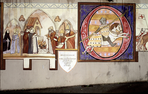 Historic fresco in the streets of Carcassonne: Saint Dominica converts the Cathars