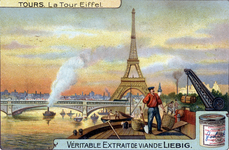 The Eiffel Tower seen from the Seine in Paris in the evening.